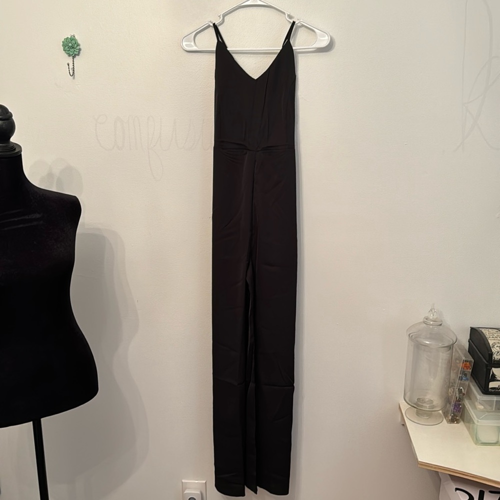 NWOT Black Jumpsuit with Tie-up back Medium